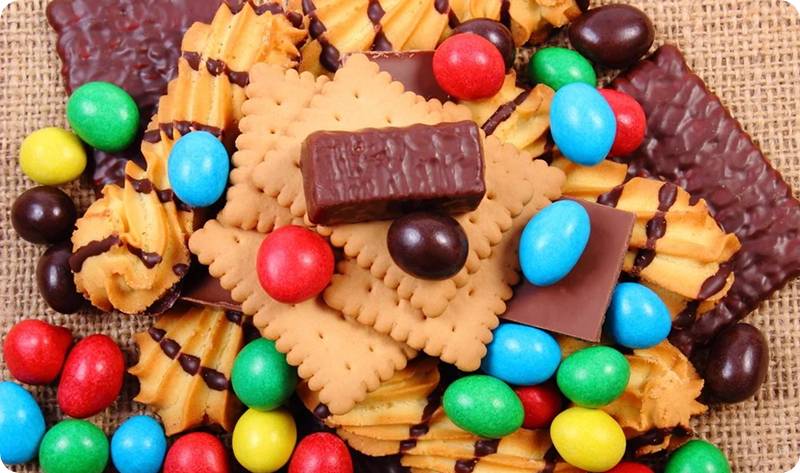 a group of cookies and candy